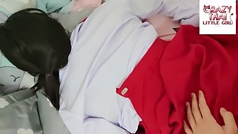 A Thai Student In A Red Skirt Engages In Sexual Activity With Her Partner In Their Dormitory