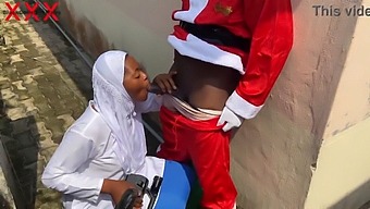 A Joyful Christmas Encounter With Santa And A Seductive Woman In Hijab. Sign Up For Red