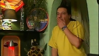 A Blonde Woman Is Penetrated By Two Men In A Bar
